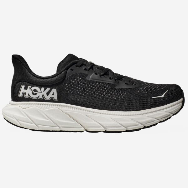 HOKA arahi 7 WIDE är en bred löparsko med pronationsstöd för herr i färg: svart vit.